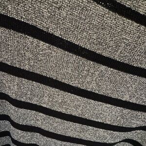 Silver and black dress. Has a bit of shine. Worn twice.